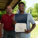 Dezlen Long receiving the 2026 Greenspan Scholarship Award.