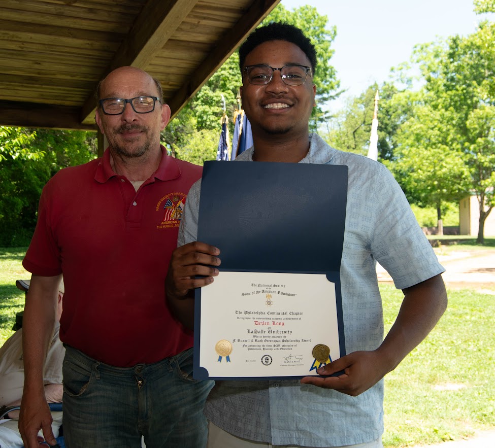 Dezlen Long receiving the 2026 Greenspan Scholarship Award.